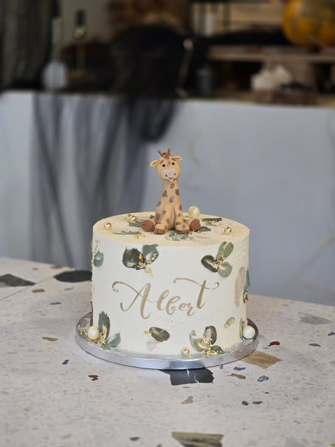 Christening cake with buttercream leaves