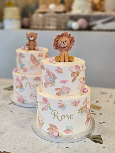 Christening cake with buttercream leaves
