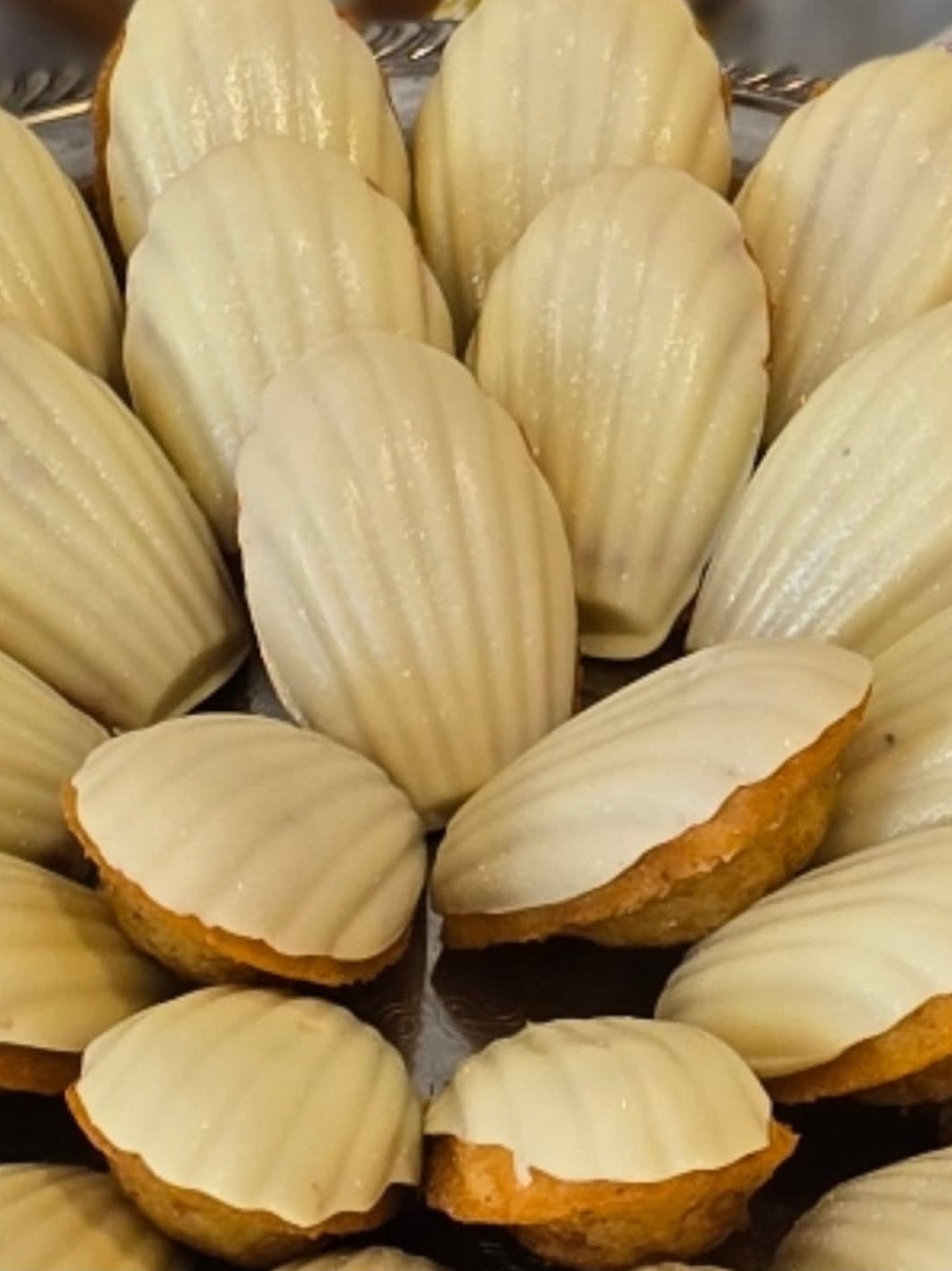 Madeleines with white chocolate